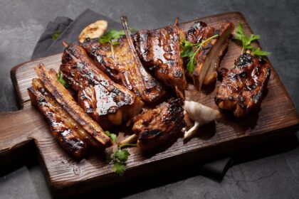 beef ribs teriyaki style sliced on plank